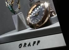Luxury clocks and watches are displayed inside a Graff Diamonds store in Hong Kon