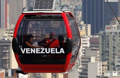 Commuters travel in a Metrocable cabin in Caracas