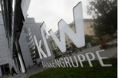 A man walks outside the local branch of the KfW bank in Frankfurt