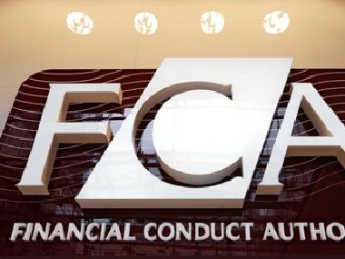 The logo of the new Financial Conduct Authority (FCA) is seen at the agency's headquarters in the Canary Wharf business district of London