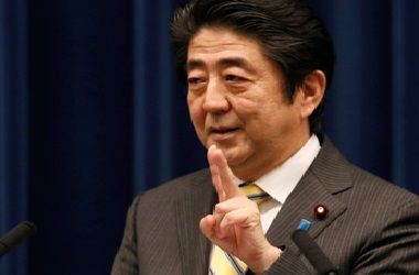 Japan's Prime Minister Shinzo Abe gestures during a news conference 