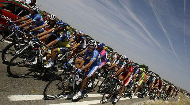The peloton rides during the 19th stage of the Tour of Spain “La Vuelta” cycling race