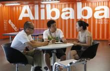Employees hold a meeting inside the headquarters office of Alibaba (China) Technology Co. Ltd on the