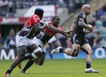 New Zealand's D J Forbes makes a break and goes on to score during the pool games of the Sevens Worl