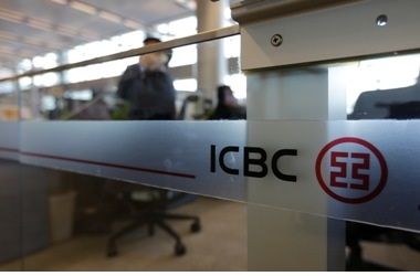 An employee speaks on the phone in the headquarters of Industrial and Commercial Bank of China Ltd (ICBC) in Beijing