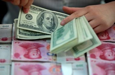 US dollar and Chinese yuan banknotes