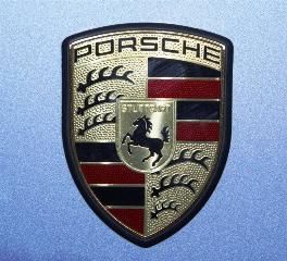 The Porsche logo is displayed at the 80th Geneva Car Show at the Palexpo in Geneva