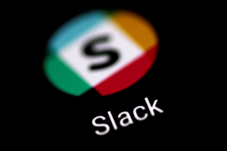 The Slack messaging application is seen on a phone screen