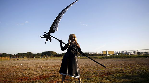 A cosplay enthusiast poses as Maka Albarn of the Soul Eater anime series during the “Anime Friends” annual event in Sao Paulo