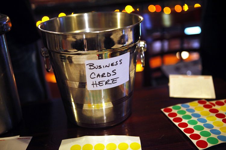 A champagne bucket for members to drop off business cards