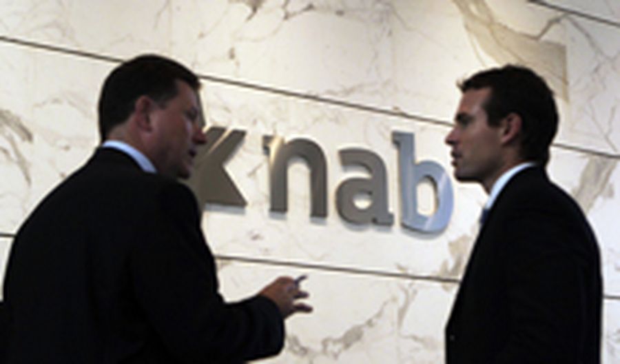 Two office workers chat at the National Australia Bank (NAB) building in central Sydney