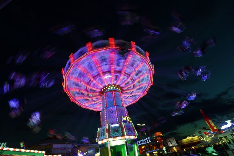 Visitors ride a merry-go-round at Oktoberfest
