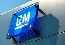 The General Motors logo is seen outside its headquarters at the Renaissance Center in Detroit, Michigan