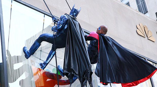 Co-hosts of NBC’s the ‘Today’ show dressed as Batman and Robin, rappel down a building during the program’s annual Halloween show