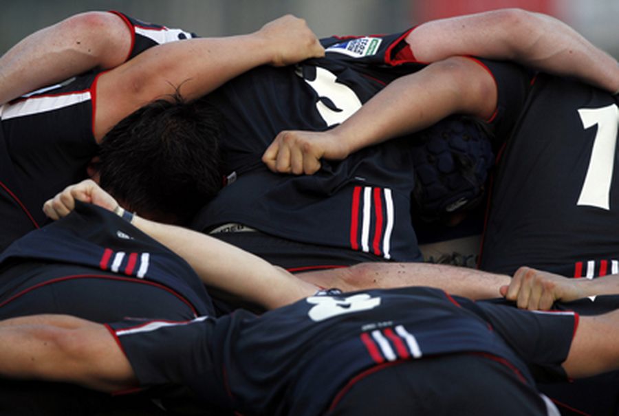 Hong Kong players form a scrum during their HSBC Asian 5 Nations rugby match against South Korea in 