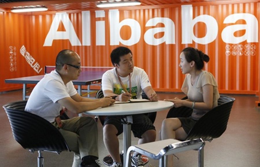 Employees hold a meeting inside the headquarters of Alibaba (China) Technology on the outskirts of Hangzhou. 